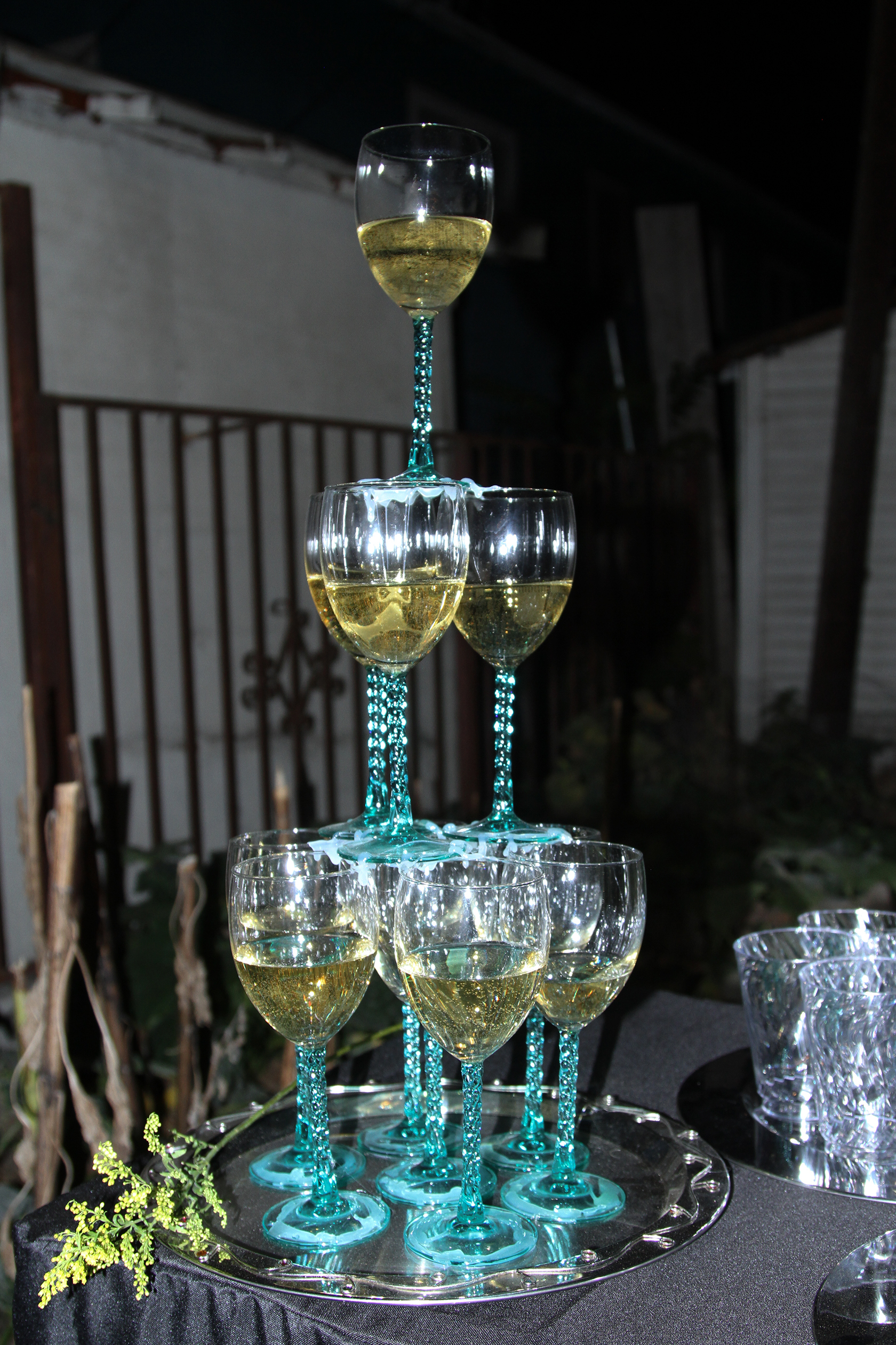 Tower of champaign glasses on a silver tray